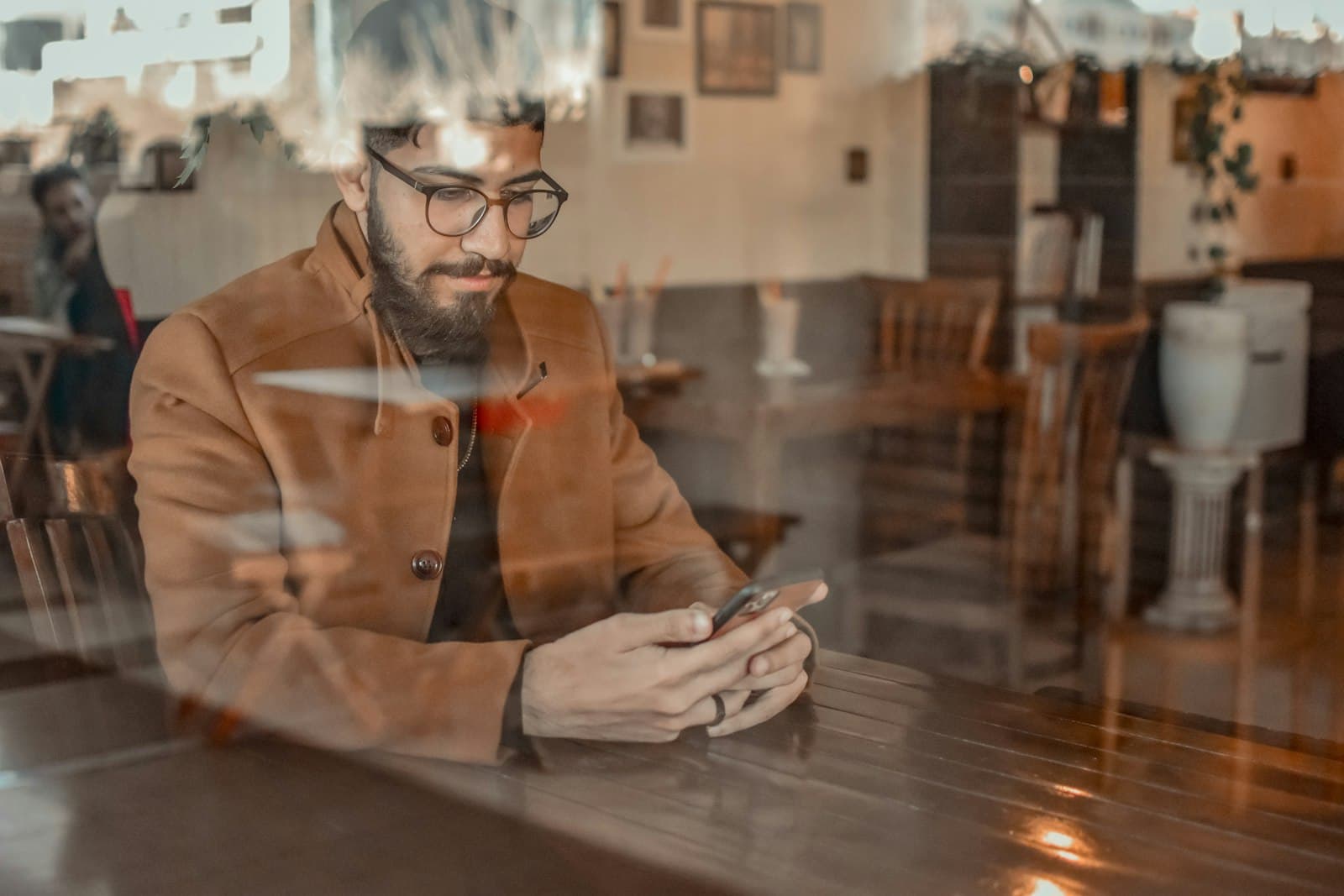 Customer checking a phone after finding a local business online