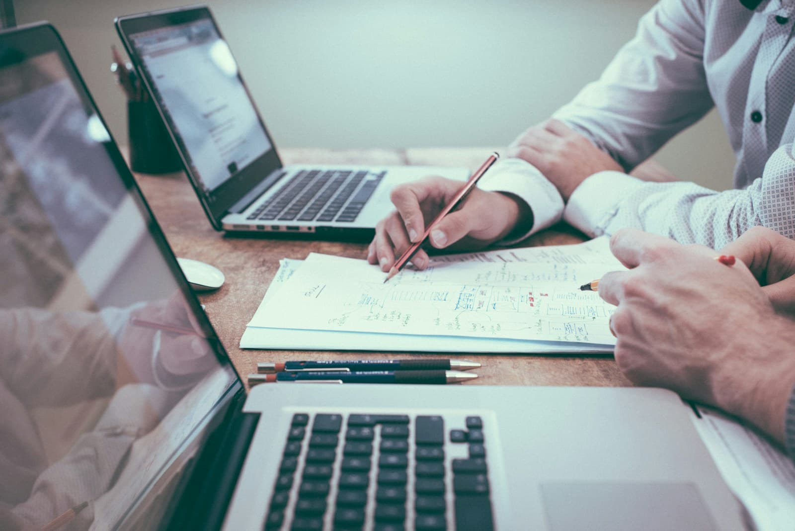 Website action plan beside a laptop
